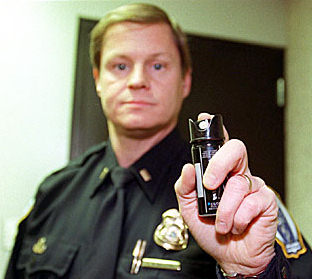 Police Officer with pepper spray